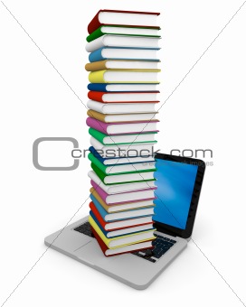 Pile of books on laptop