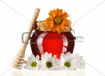 Jar of honey and dipper