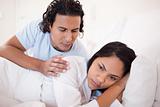 Man trying to calm down his girlfriend