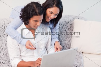 Couple booking vacations online