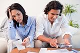 Couple having a hard time doing their finances