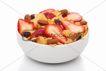Delicious breakfast with cornflakes and fruits, over white