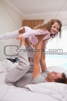 Father letting his daughter fly