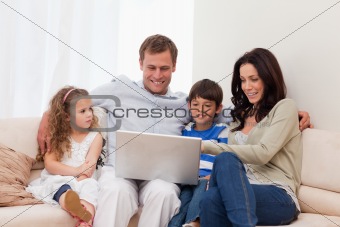 Family surfing the internet together