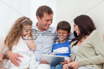 Family using tablet together