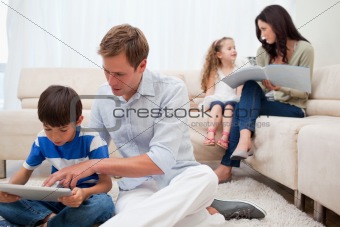 Family spending spare time in the living room