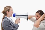 Manager yelling at her coworker through a megaphone
