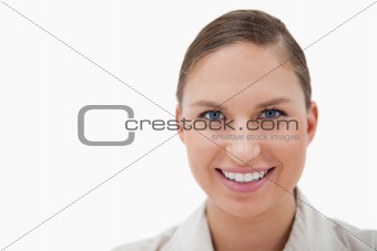 Close up of a young businesswoman smiling at the camera