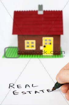 Text real estate and house on background