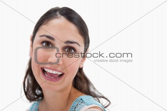 Close up of a cheerful woman smiling at the camera