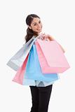 Portrait of a happy woman posing with shopping bags