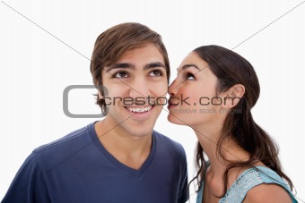 Lovely woman whispering something to her fiance