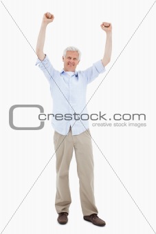 Portrait of a mature man with the arms up