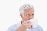 Mature man drinking coffee