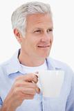 Portrait of a mature man drinking tea