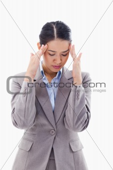 Portrait of a beautiful businesswoman having a headache