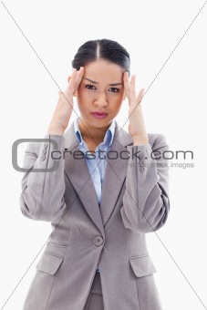 Portrait of a gorgeous businesswoman having a headache