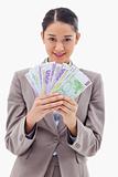 Portrait of a businesswoman holding bank notes