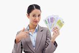 Businesswoman holding bank notes