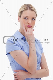 Thoughtful standing woman