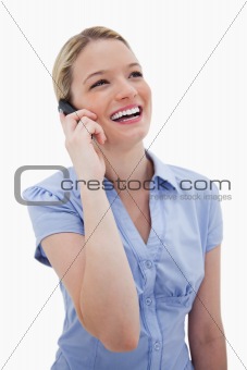 Laughing woman on the phone