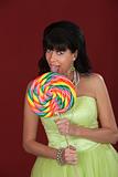 Woman Licks Lollipop