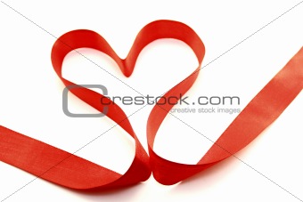 Beautiful heart from red satin ribbon