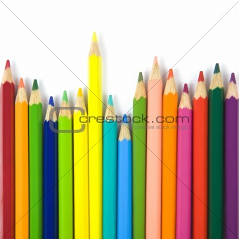 Color pencils composition on white background 
