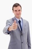 Thumb up given by businessman