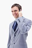 Smiling businessman on the cellphone