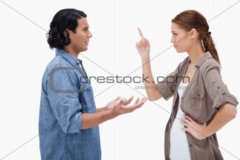 Side view of couple in a tensed conversation