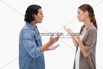 Side view of talking couple
