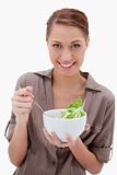 Woman with bowl of salad
