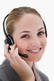 Happy smiling call center agent at work