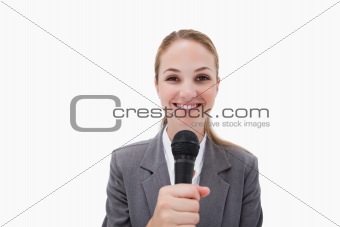 Smiling woman with microphone