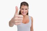 Smiling woman with the thumb up