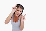 Woman dancing while listening to music
