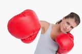 Healthy woman boxing