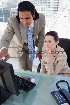 Portrait of a business team using a computer