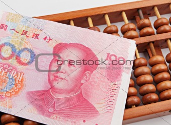 abacus and china dollar banknote
