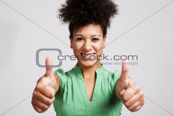 Beautiful woman with thumbs up