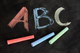 ABC written in colorful chalk