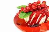Crepe cake with berry sauce closeup.