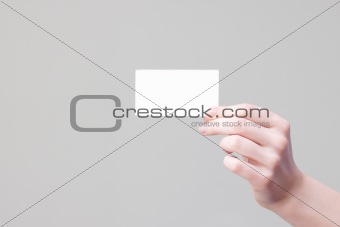 Arm holding businesscard with empty place for information and lo