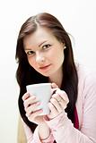 Woman enjoy drink with a cup