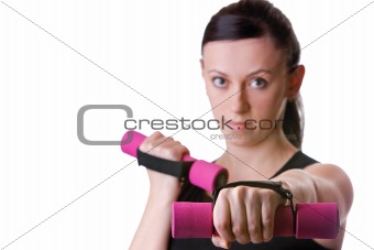 Young woman holding weights