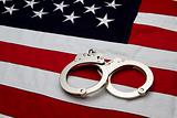 US Flag and Handcuffs