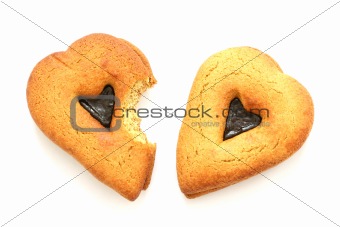 Gingerbread in heart shapes on white background