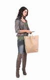 young woman with shopping and cash