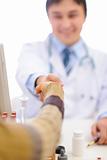 Closeup on handshake of medical doctor and patient